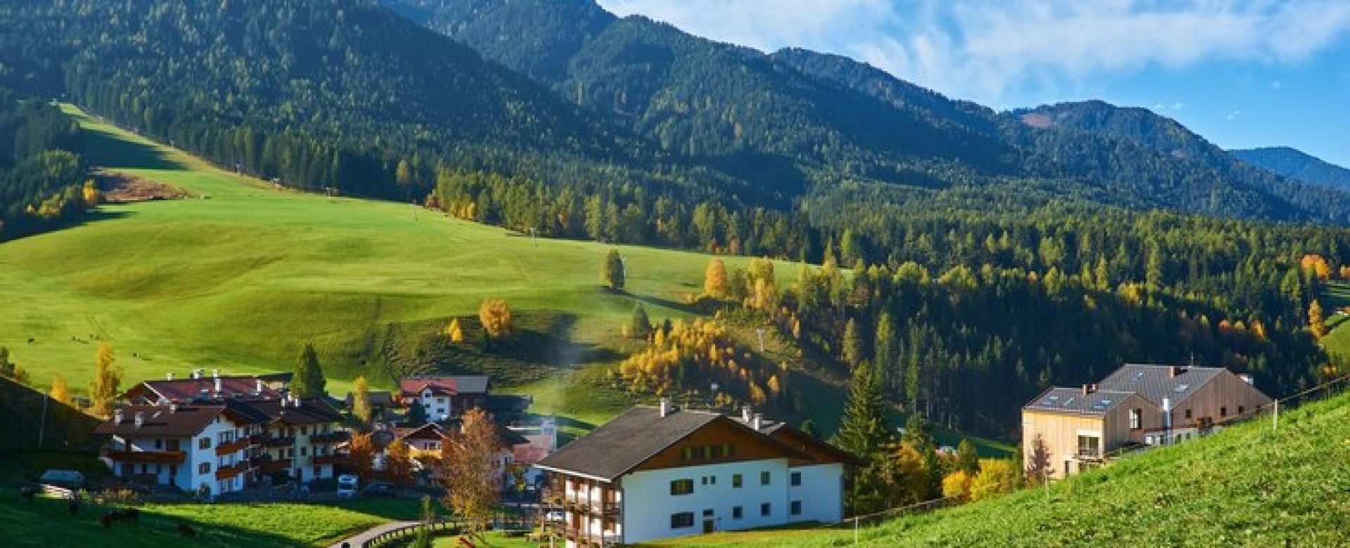 amazing-autumn-scenery-santa-maddalena-village-with-church-colorful-trees-meadows-rising-sun-rays-dolomite-alps-italy_661209-245