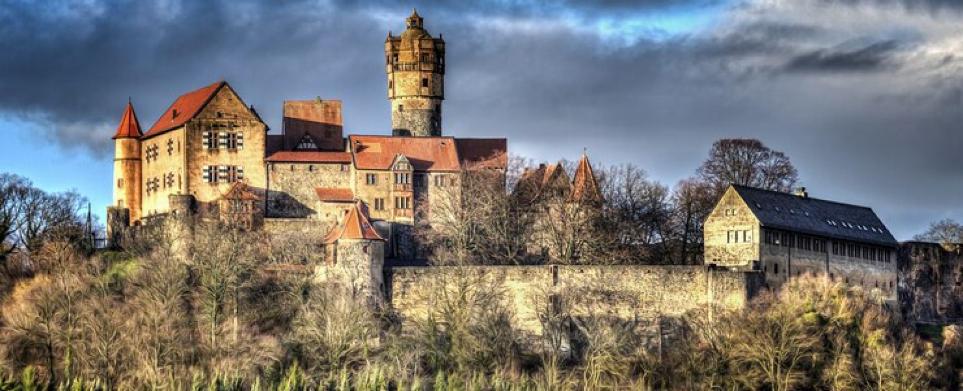 beautiful-historical-castle-dark-cloudy-sky_181624-8799