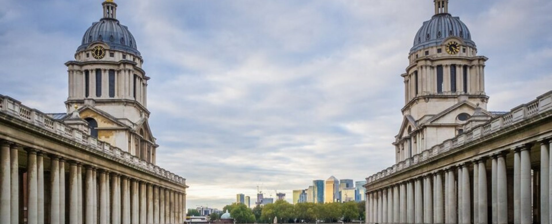 closeup-shot-two-domed-towers-old-royal-naval-college-greenwich-london_181624-44376