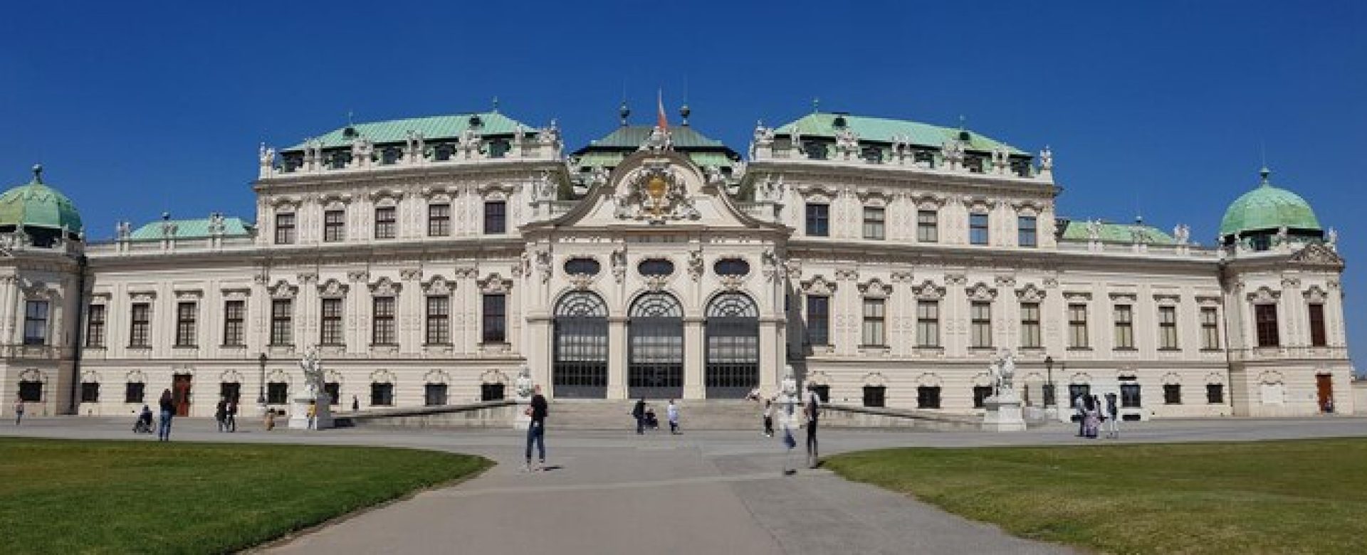 facade-historical-building-against-clear-blue-sky_1048944-29202203