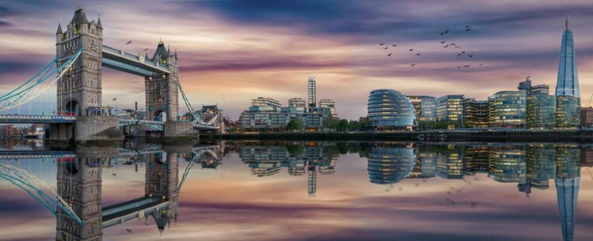 reflection-buildings-river-sunset_1048944-30191289