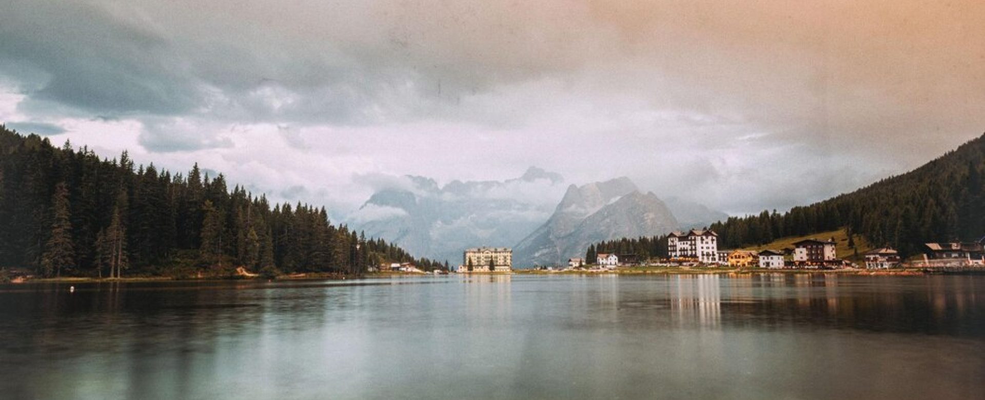 scenic-view-lake-misurina-against-cloudy-sky-sunset_1048944-14912077