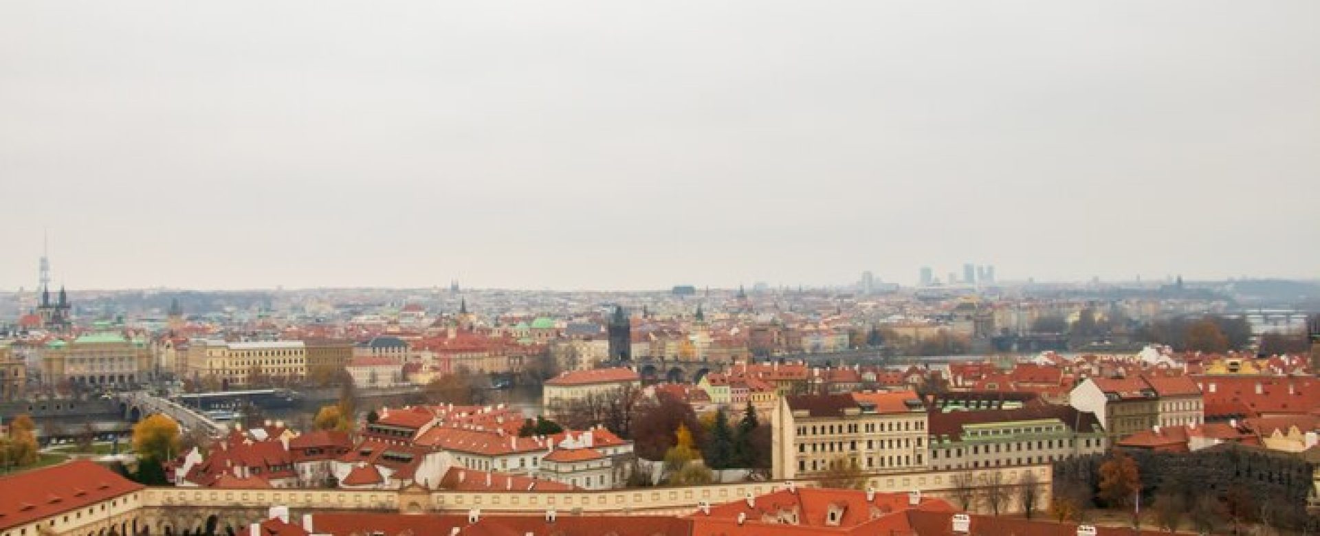 wide-angle-view-buildings-prague-clouded-sky_181624-17803